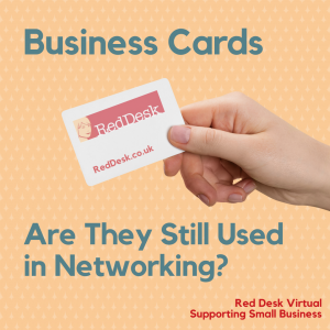 picture of Red Desk business cards on salmon pink background with the text "Are they still used in networking"