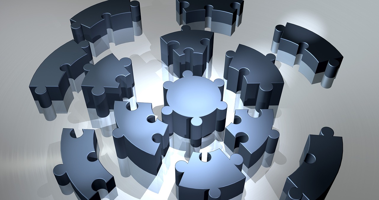pieces of a circular jigsaw puzzle spaced apart