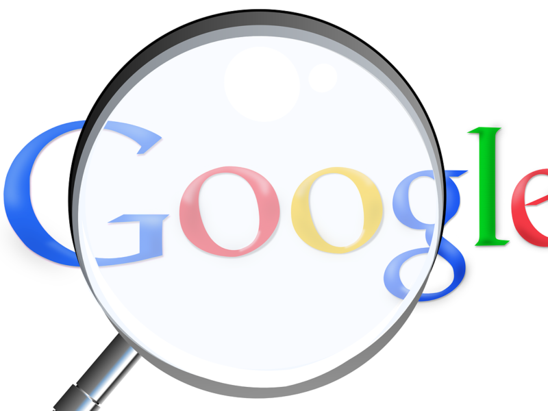 Small business owner updating a Google Business Profile to improve local SEO and customer visibility